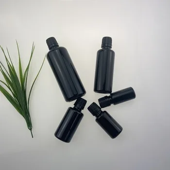 Taşınabilir Parlak Siyah Cam şişeler euro damlalıklı siyah kurcalanmaya açık kap uçucu yağ aromaterapi kozmetik kapları