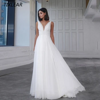 TİXLEAR Klasik V Yaka düğün elbisesi Dantel Aplikler Kolsuz Backless Şifon gelin kıyafeti Plise Kat Uzunluk Vestidos De Novia